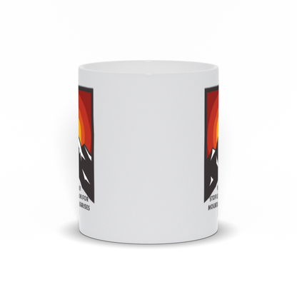 Mountain Coffee Mug - Sunrise Behind Mountain with Never Stop Looking for Mountain Sunrises Coffee Mug